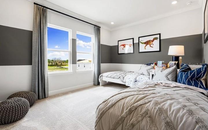 11270 Kingly Lane Odessa, FL 33556 - Photo 13 of 19 a bedroom with a bed and a window