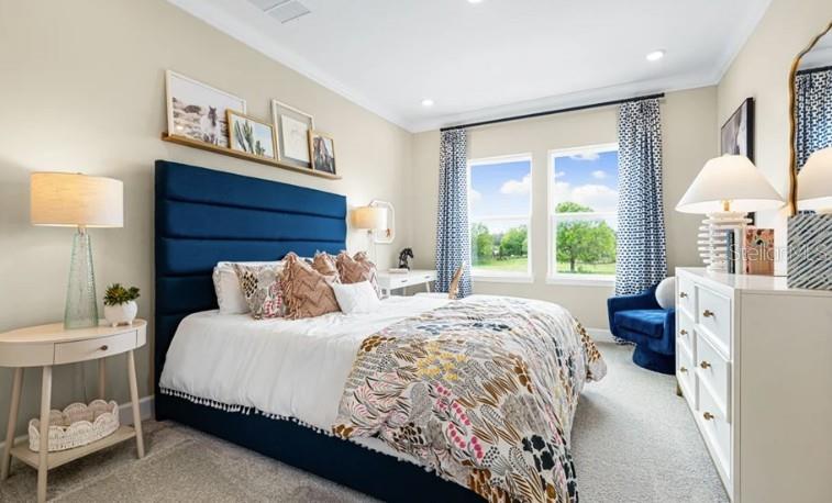 11270 Kingly Lane Odessa, FL 33556 - Photo 16 of 19 a bedroom with a bed and a window