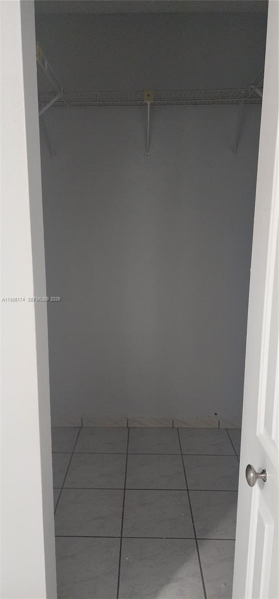 2574 West 71st Place Hialeah, FL 33016 - Photo 7 of 17 close up of a white marble wall
