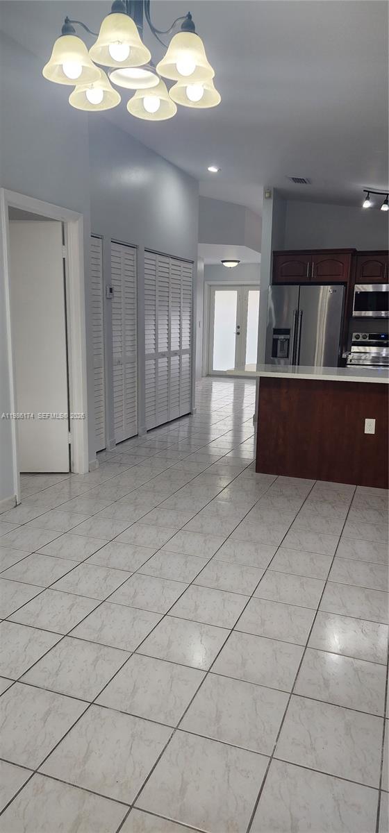 2574 West 71st Place Hialeah, FL 33016 - Photo 9 of 17 a view of kitchen with windows