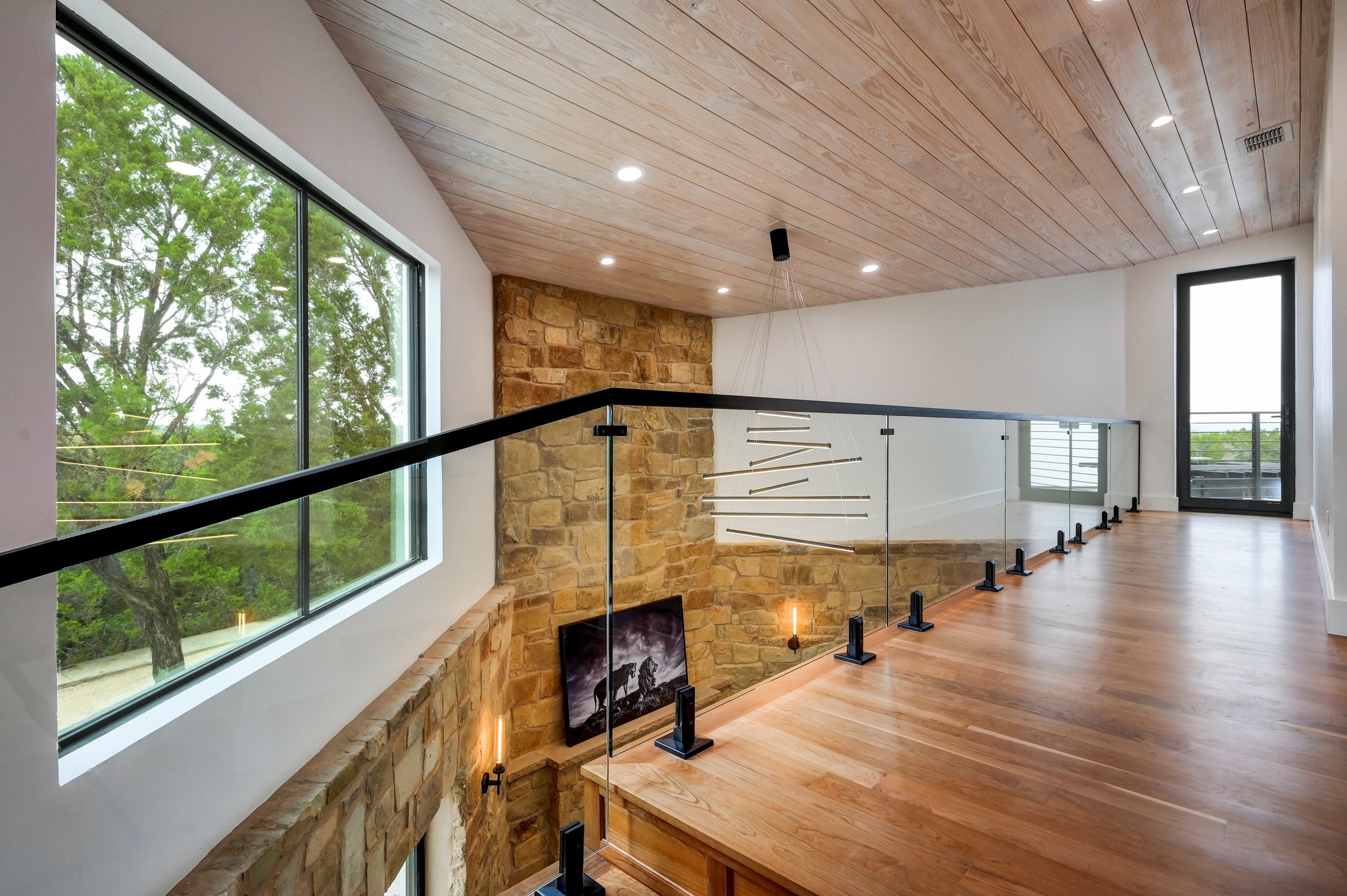 700 Rancho Grande Drive Wimberley, TX 78676 - Photo 20 of 39 Landing at the top of the stairs overlooking family room