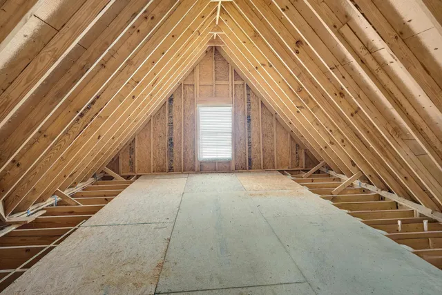 a view of backyard with garage
