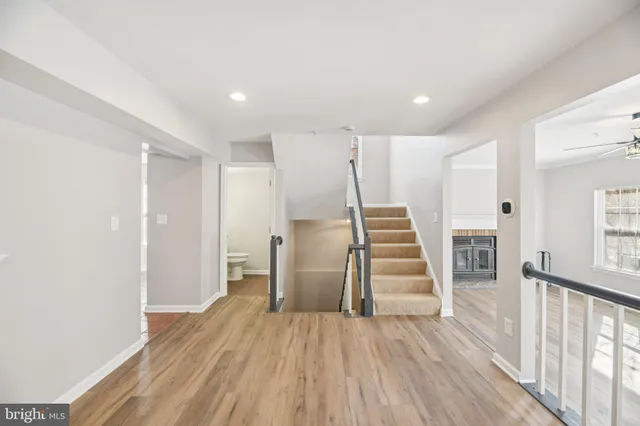 a view of entryway with wooden floor