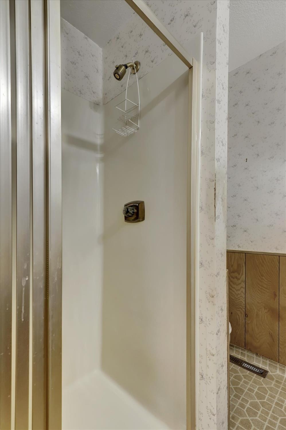 13032 Thistle Loop Penn Valley, CA 95946 - Photo 20 of 30 a bathroom with a shower