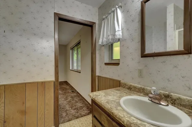 a view of a hallway with washer and dryer