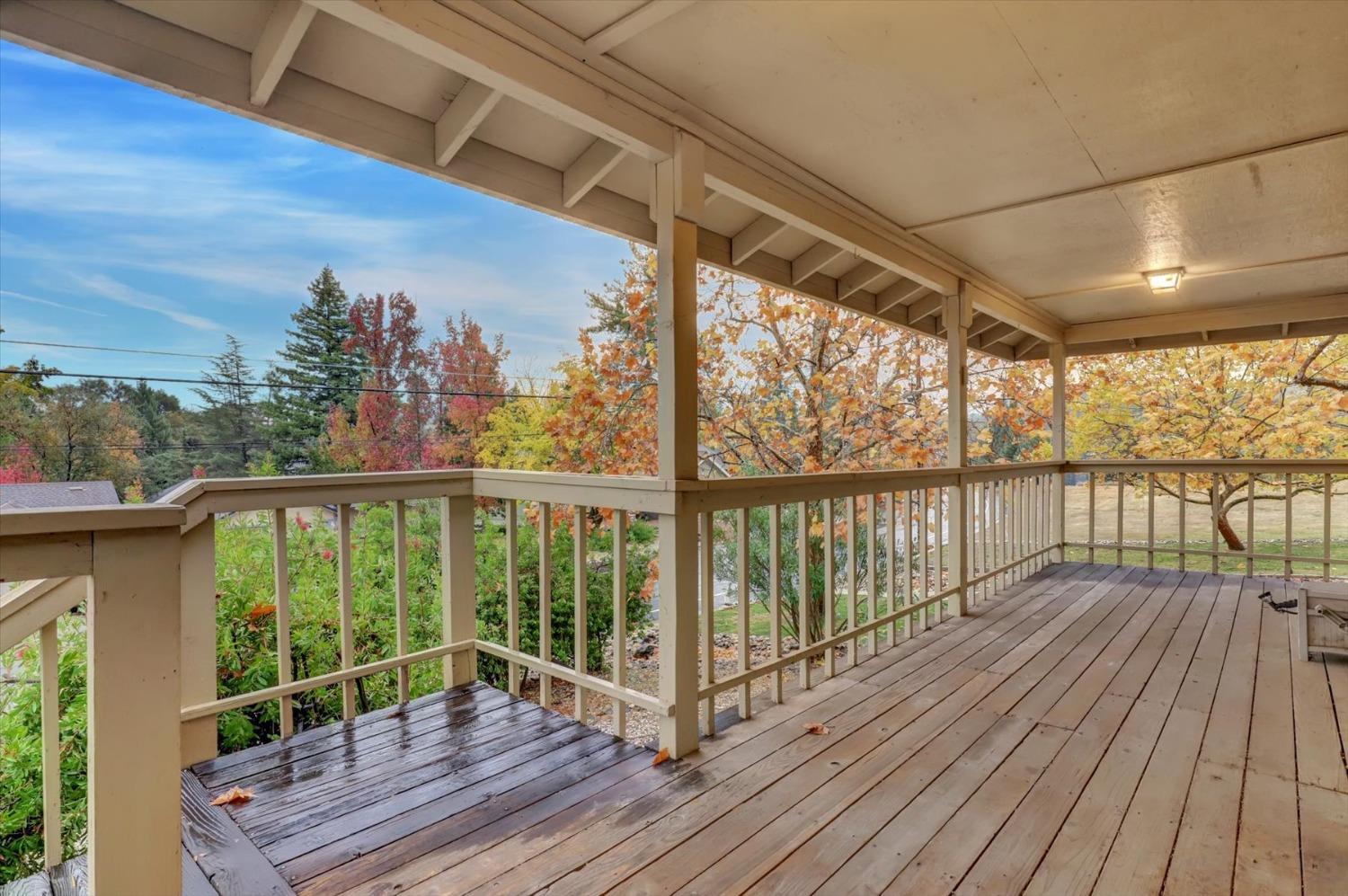 13032 Thistle Loop Penn Valley, CA 95946 - Photo 25 of 30 a view of a balcony with wooden floor