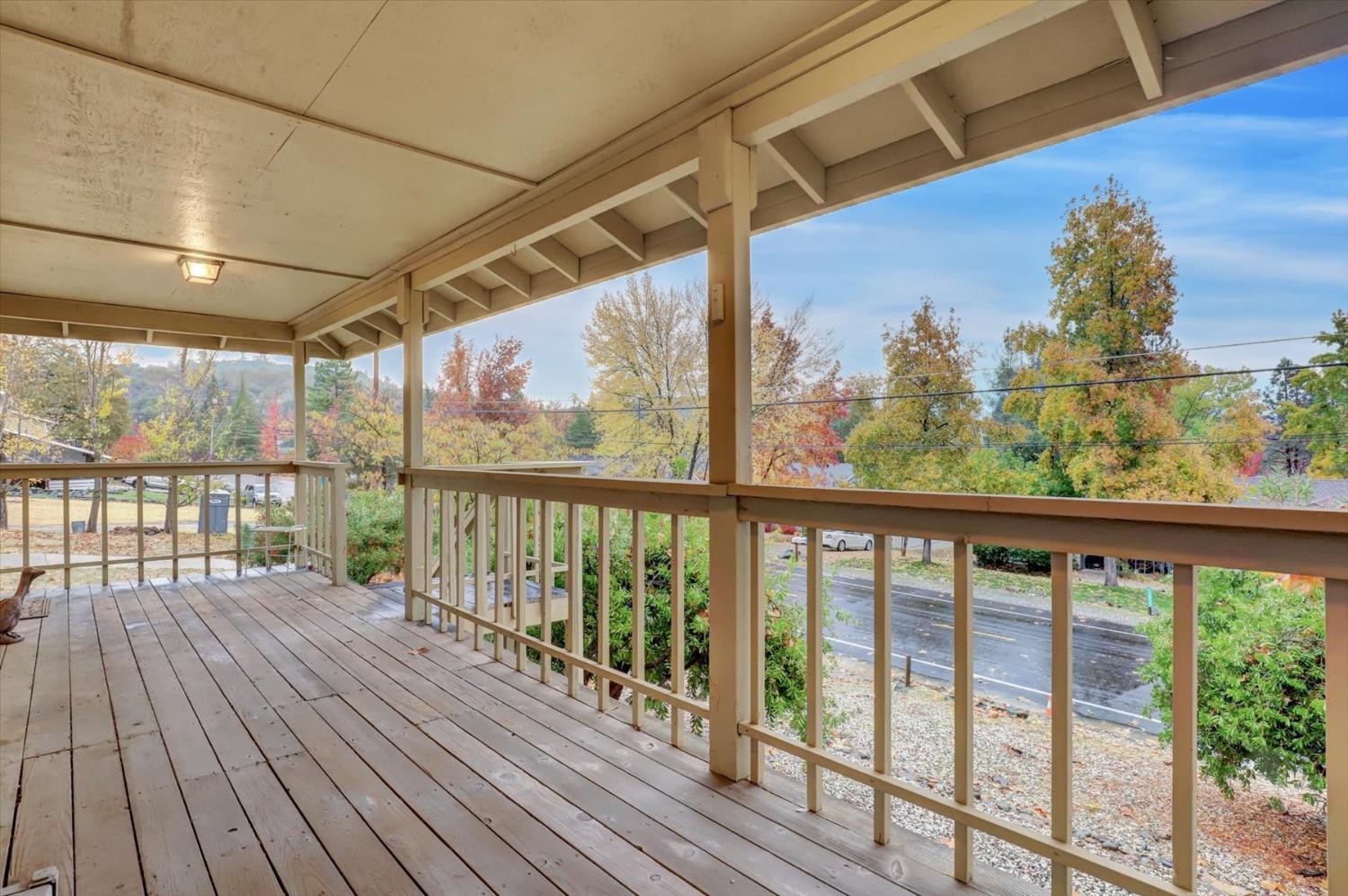 13032 Thistle Loop Penn Valley, CA 95946 - Photo 26 of 30 a view of a balcony with wooden floor