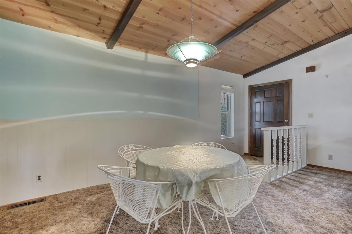 13032 Thistle Loop Penn Valley, CA 95946 - Photo 5 of 30 a view of a dining room with furniture