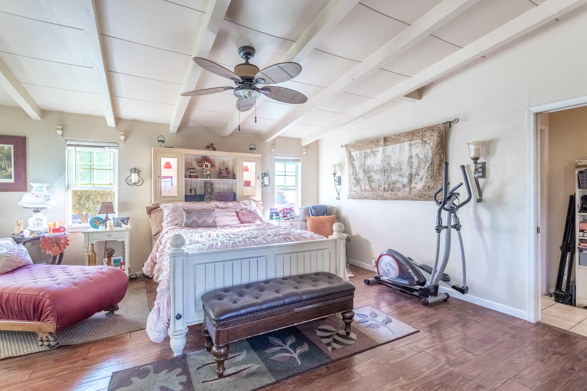 406 South Jackson Street Red Bluff, CA 96080 - Photo 11 of 26 a living room with furniture a ceiling fan and a window