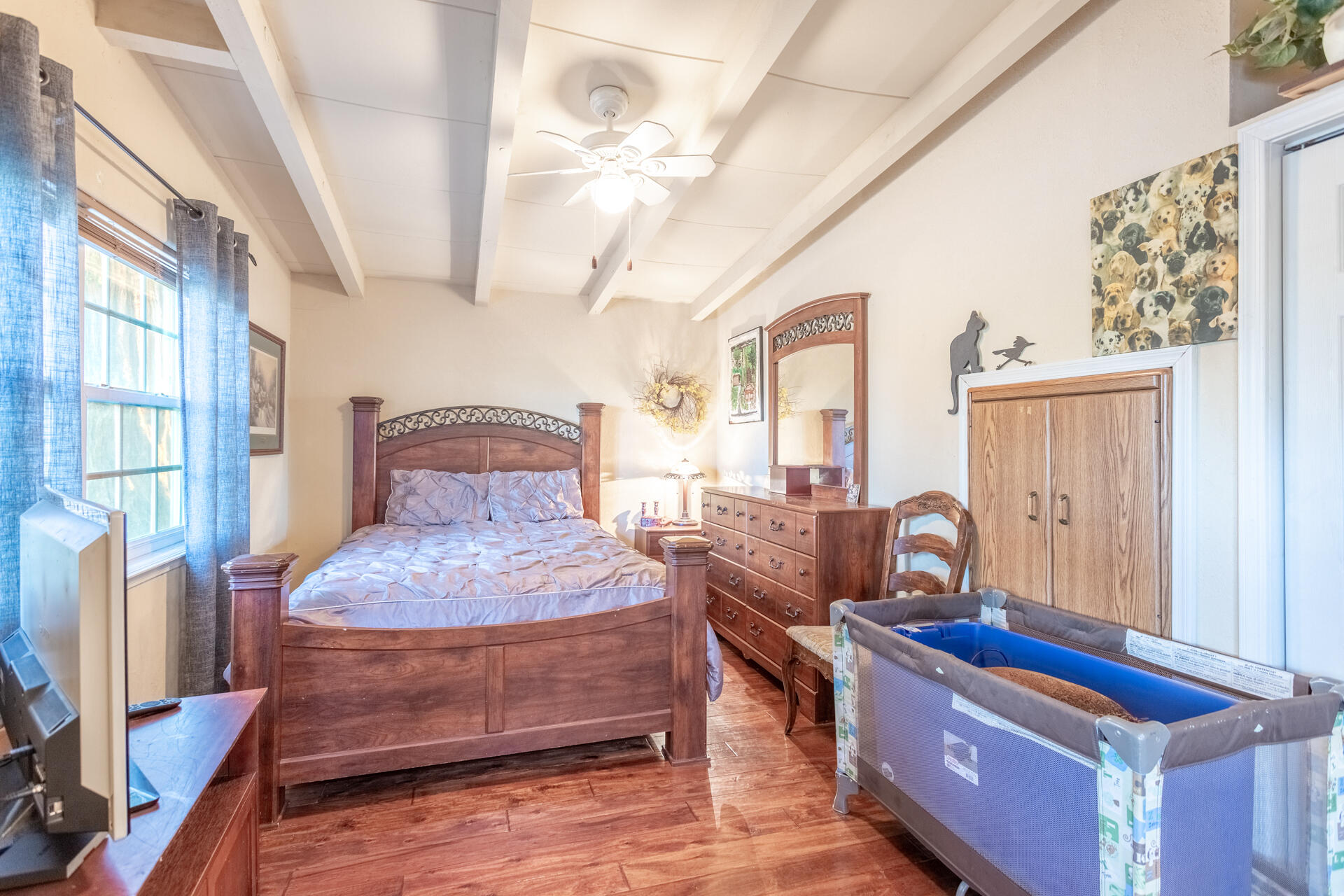 406 South Jackson Street Red Bluff, CA 96080 - Photo 14 of 26 a bedroom with furniture and a window