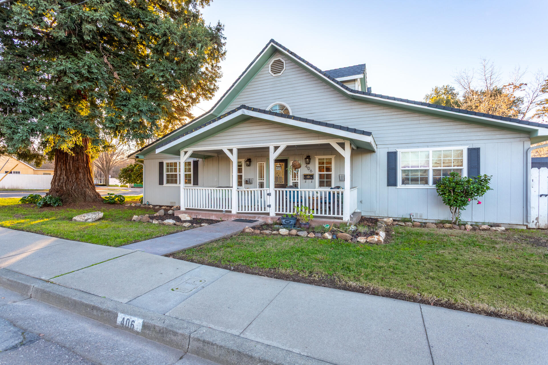 406 South Jackson Street Red Bluff, CA 96080 - Photo 21 of 26 a front view of a house with a yard and garage