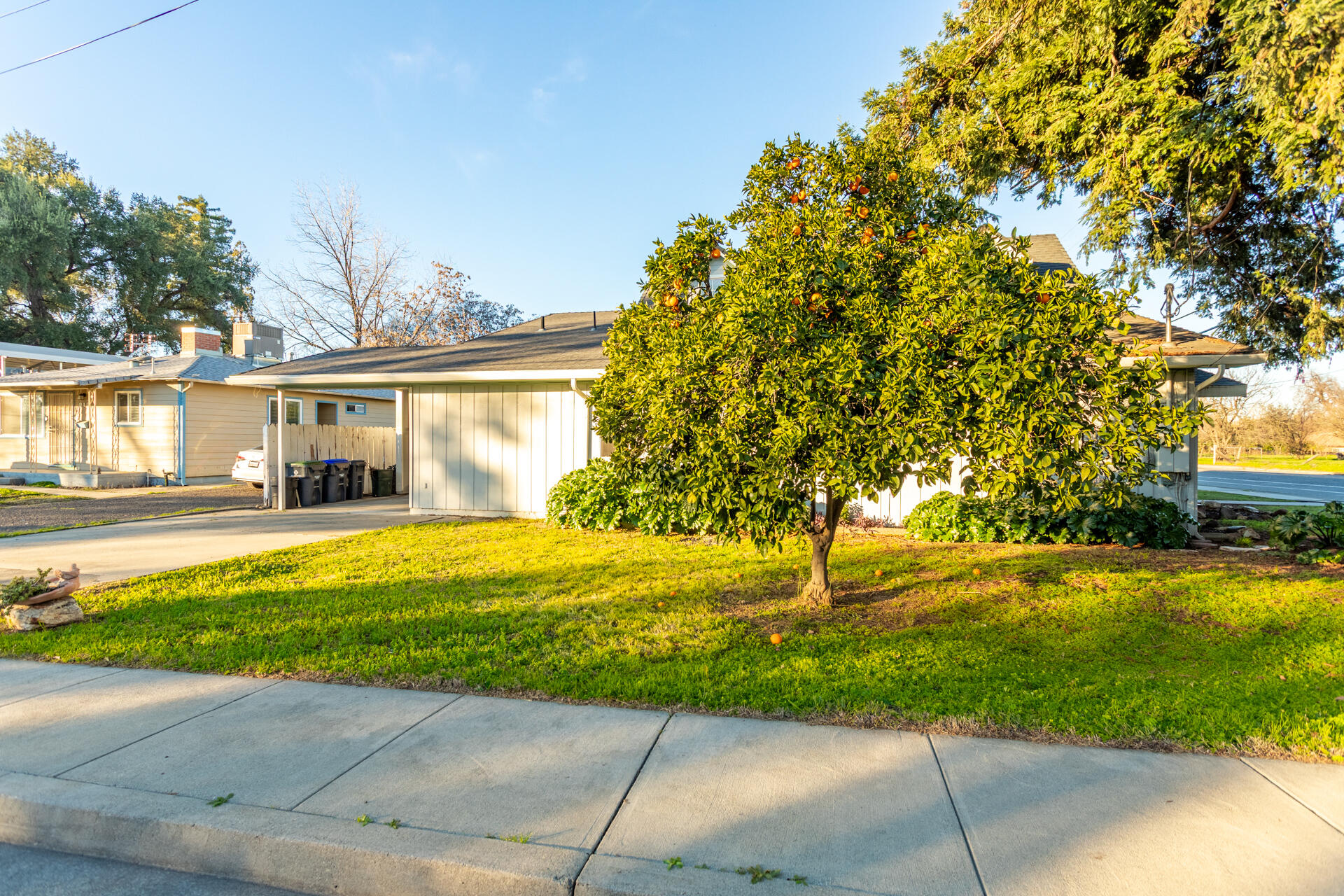 406 South Jackson Street Red Bluff, CA 96080 - Photo 22 of 26 a front view of a house with a yard