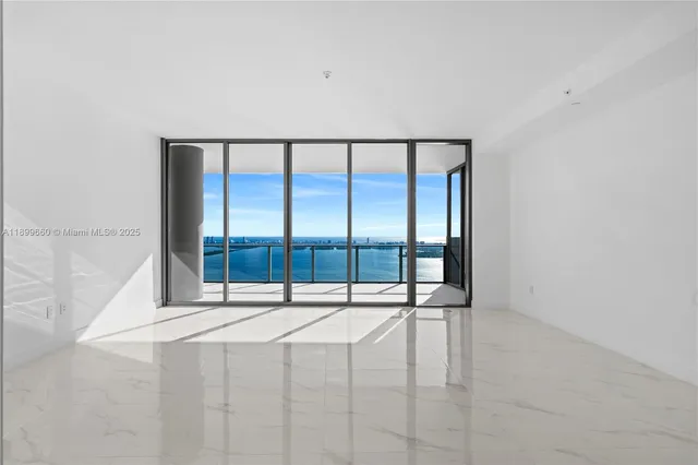 a patio with table and chairs