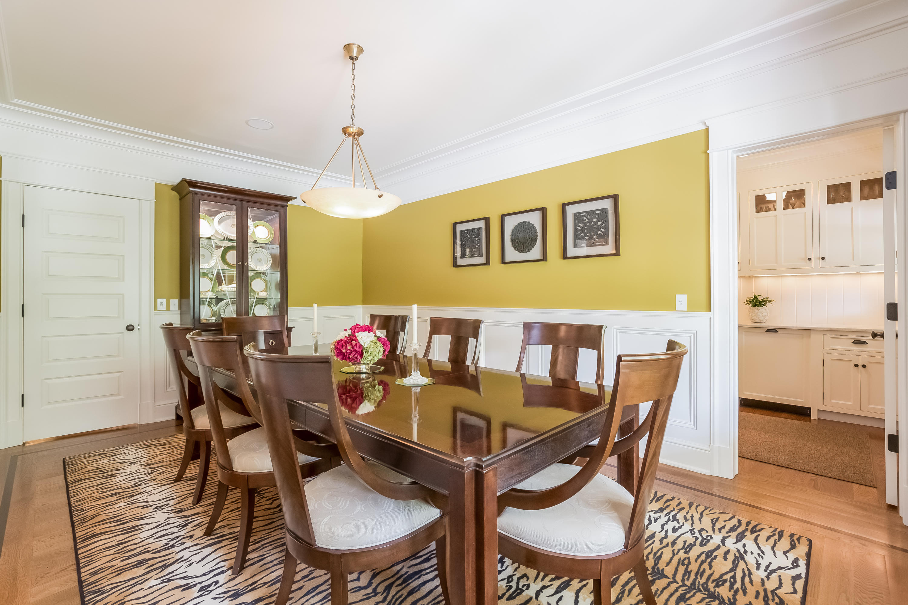 62 Stanton Road Darien, CT 06820 - Photo 16 of 52 a view of a dining room with furniture and wooden floor