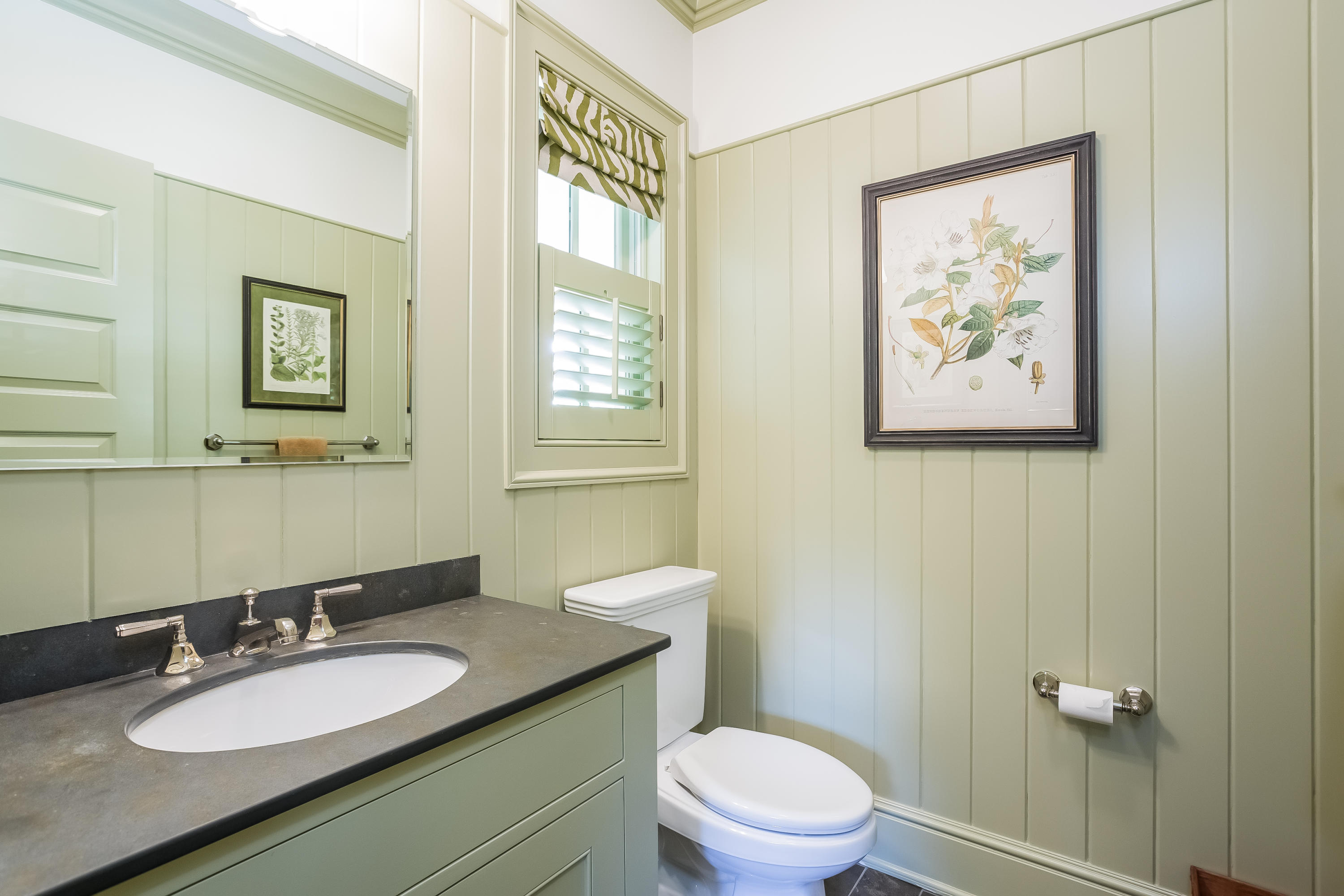 62 Stanton Road Darien, CT 06820 - Photo 19 of 52 a bathroom with a granite countertop toilet a sink and a mirror