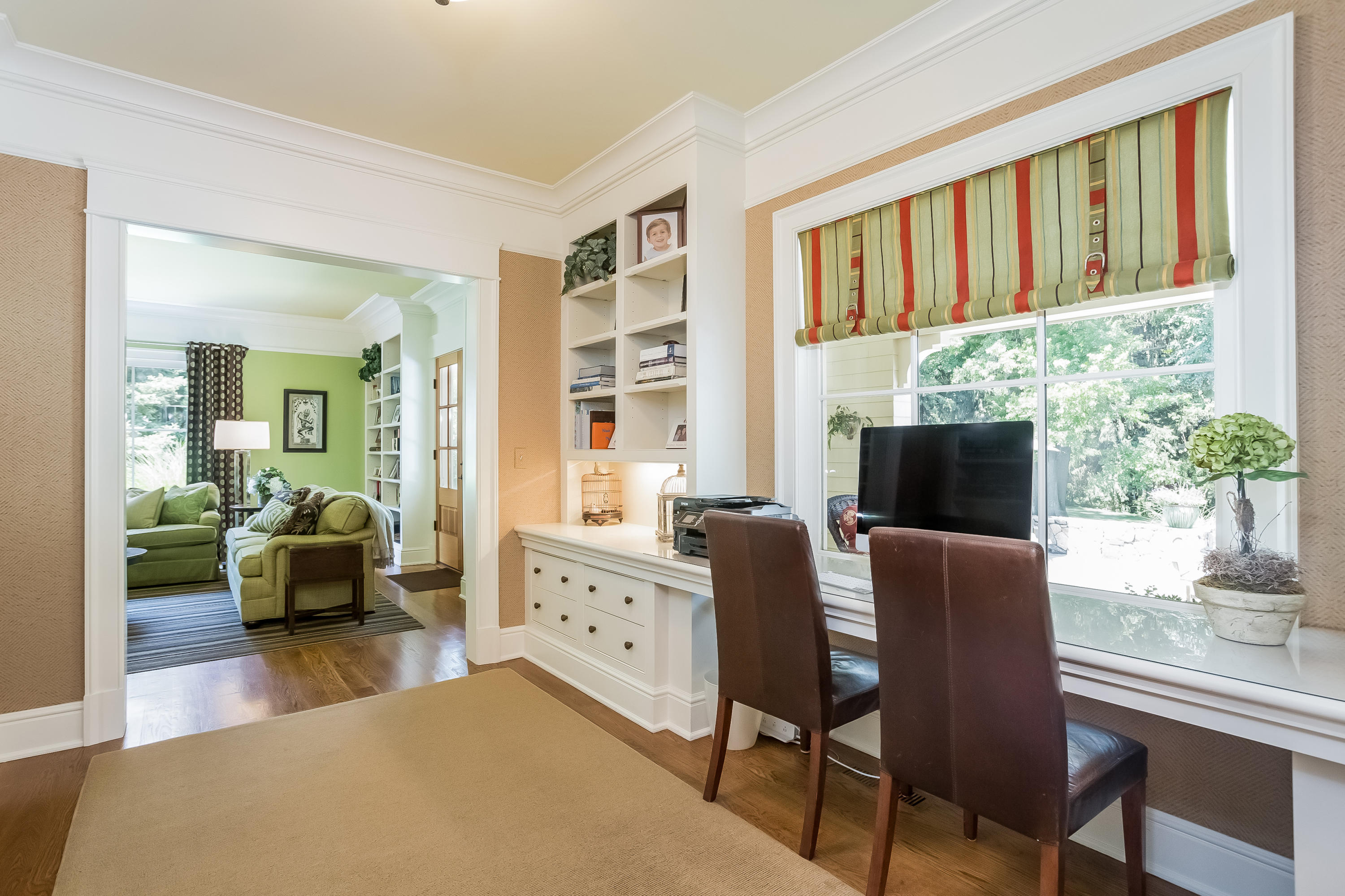 62 Stanton Road Darien, CT 06820 - Photo 20 of 52 a living room with furniture fireplace and a large window
