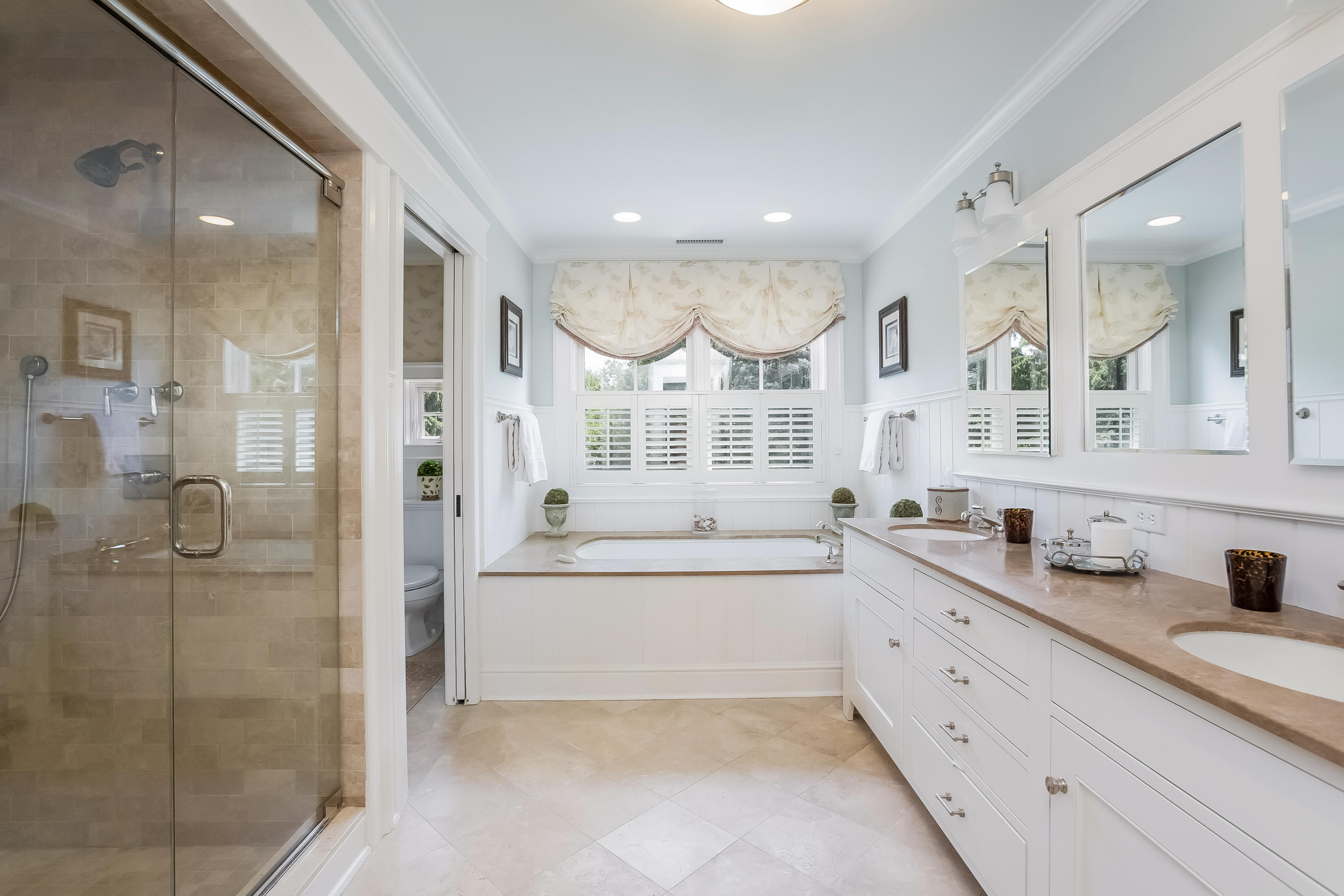62 Stanton Road Darien, CT 06820 - Photo 28 of 52 a large bathroom with a granite countertop sink mirror and shower