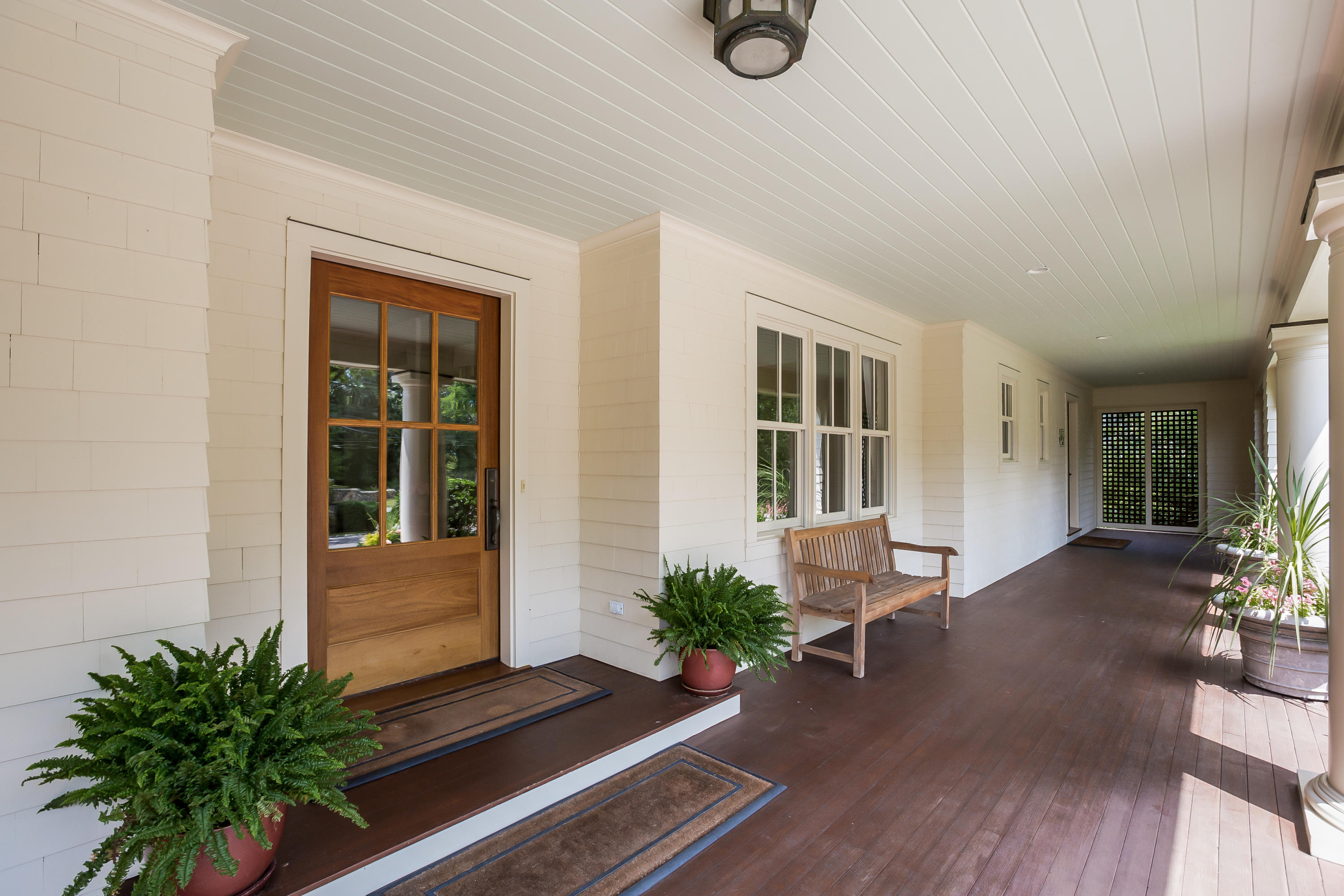 62 Stanton Road Darien, CT 06820 - Photo 3 of 52 a living room with furniture and a potted plant