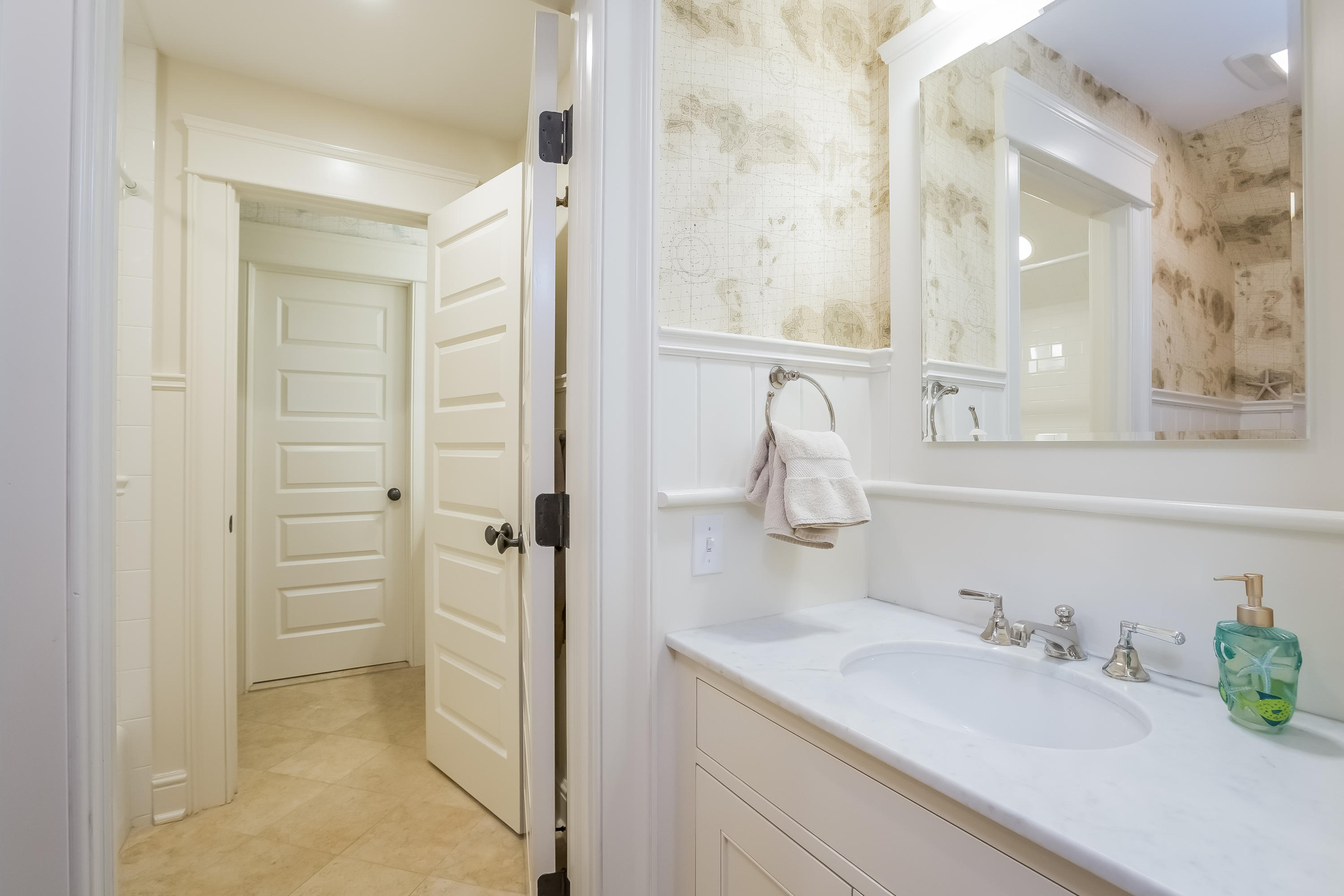 62 Stanton Road Darien, CT 06820 - Photo 32 of 52 a bathroom with a sink and a mirror