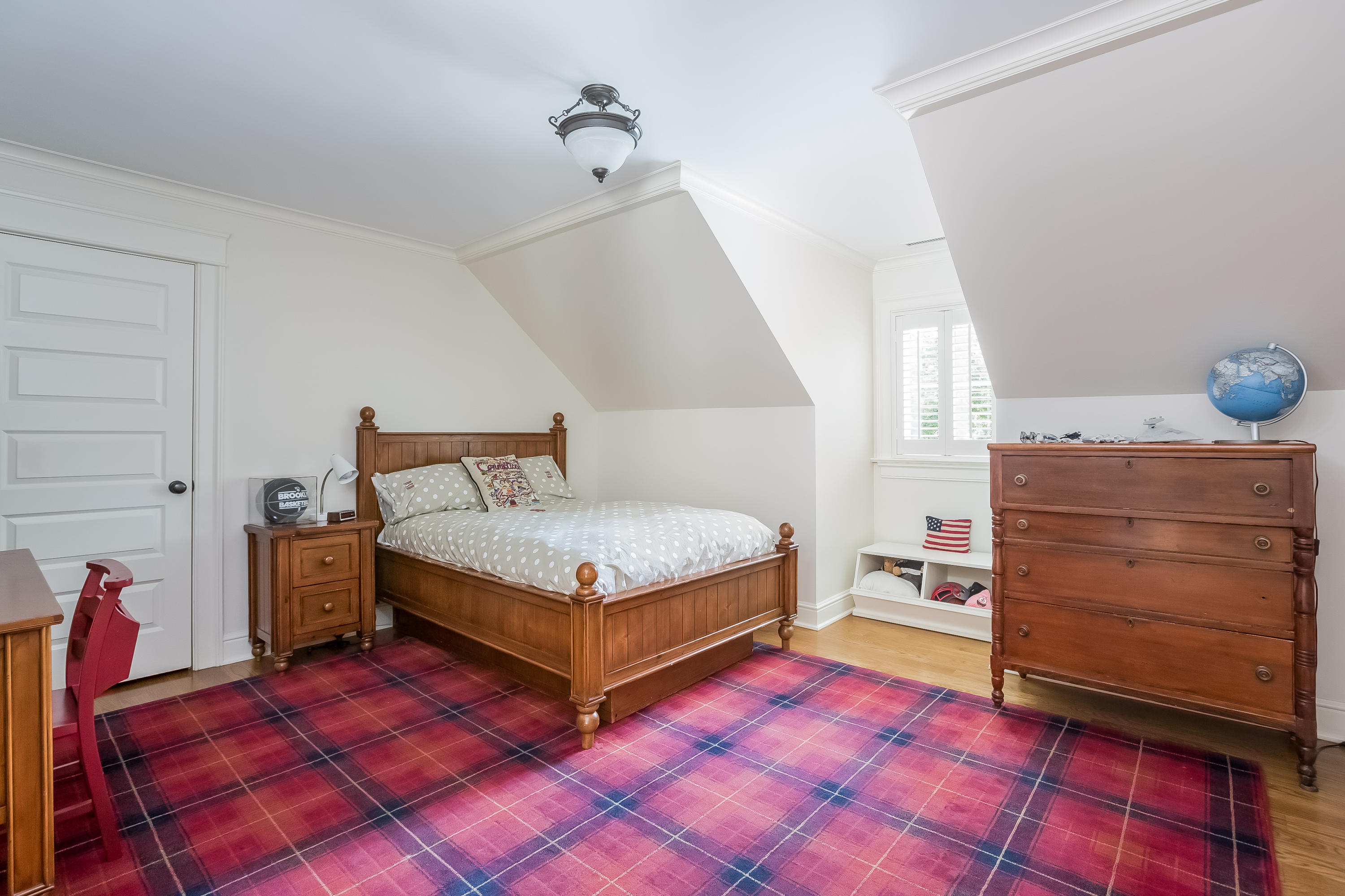 62 Stanton Road Darien, CT 06820 - Photo 33 of 52 a bedroom with a bed and wooden floor