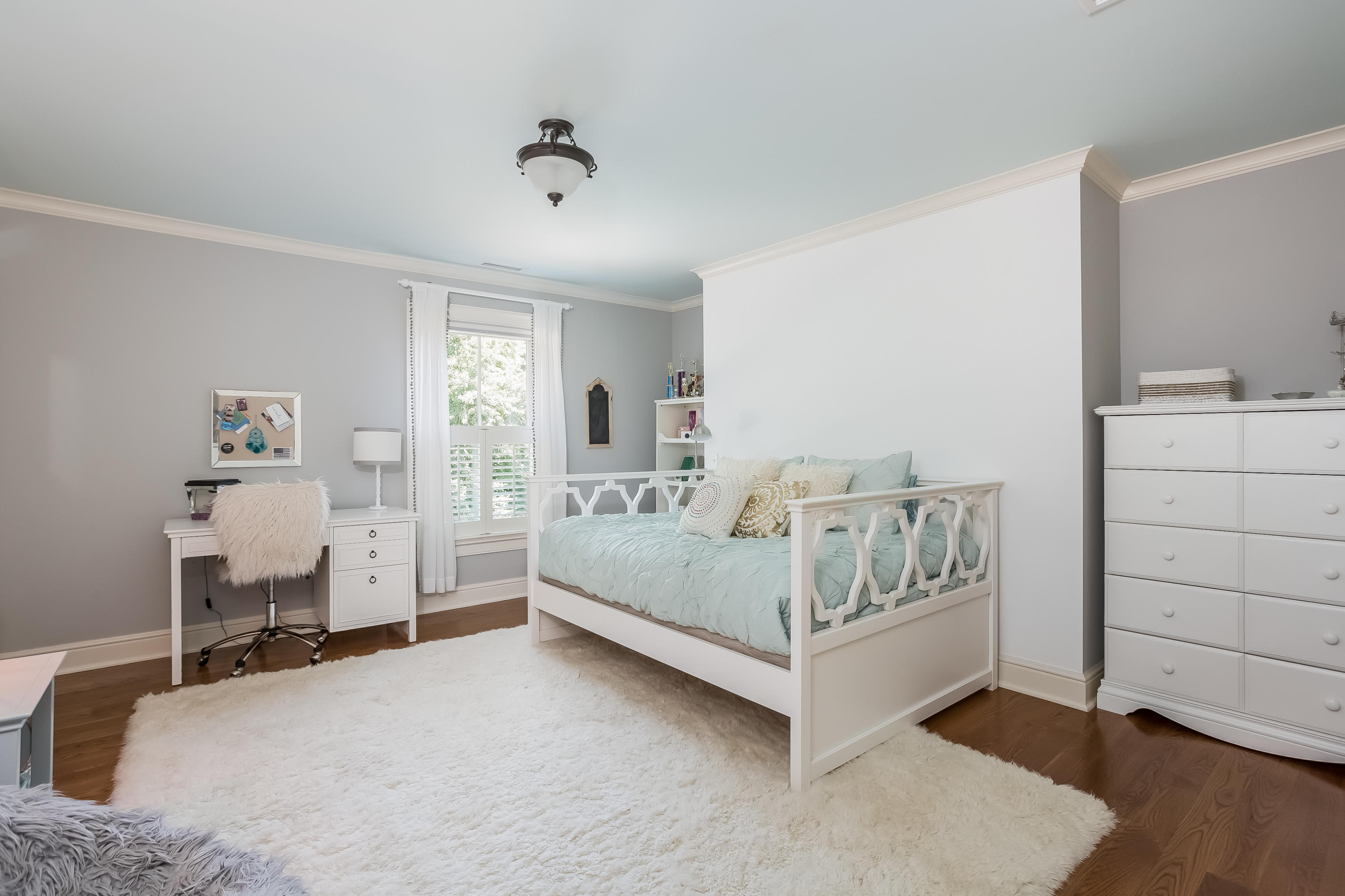 62 Stanton Road Darien, CT 06820 - Photo 34 of 52 a white bed sitting in a bedroom next to a window