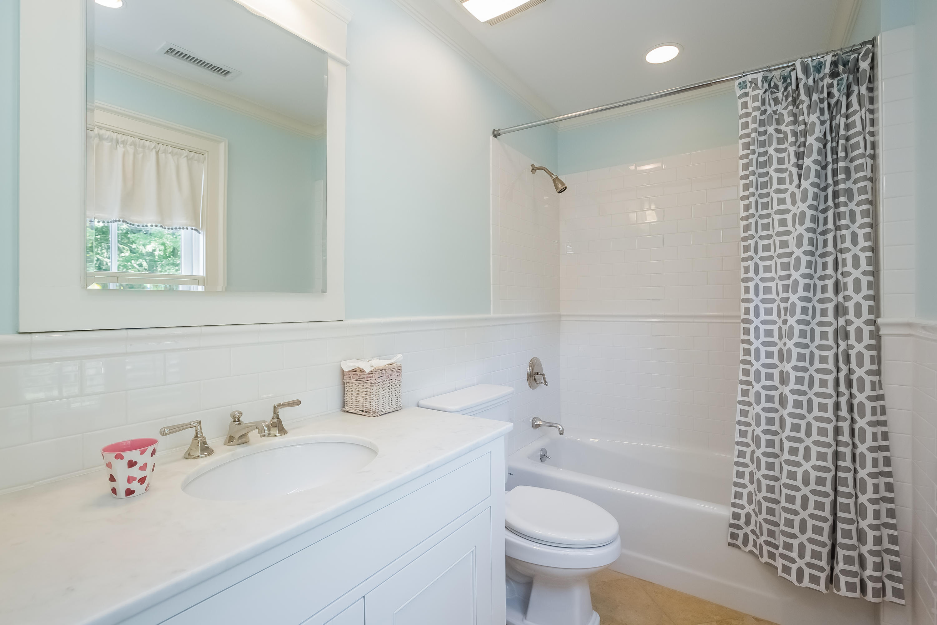 62 Stanton Road Darien, CT 06820 - Photo 35 of 52 a bathroom with a sink toilet vanity and shower