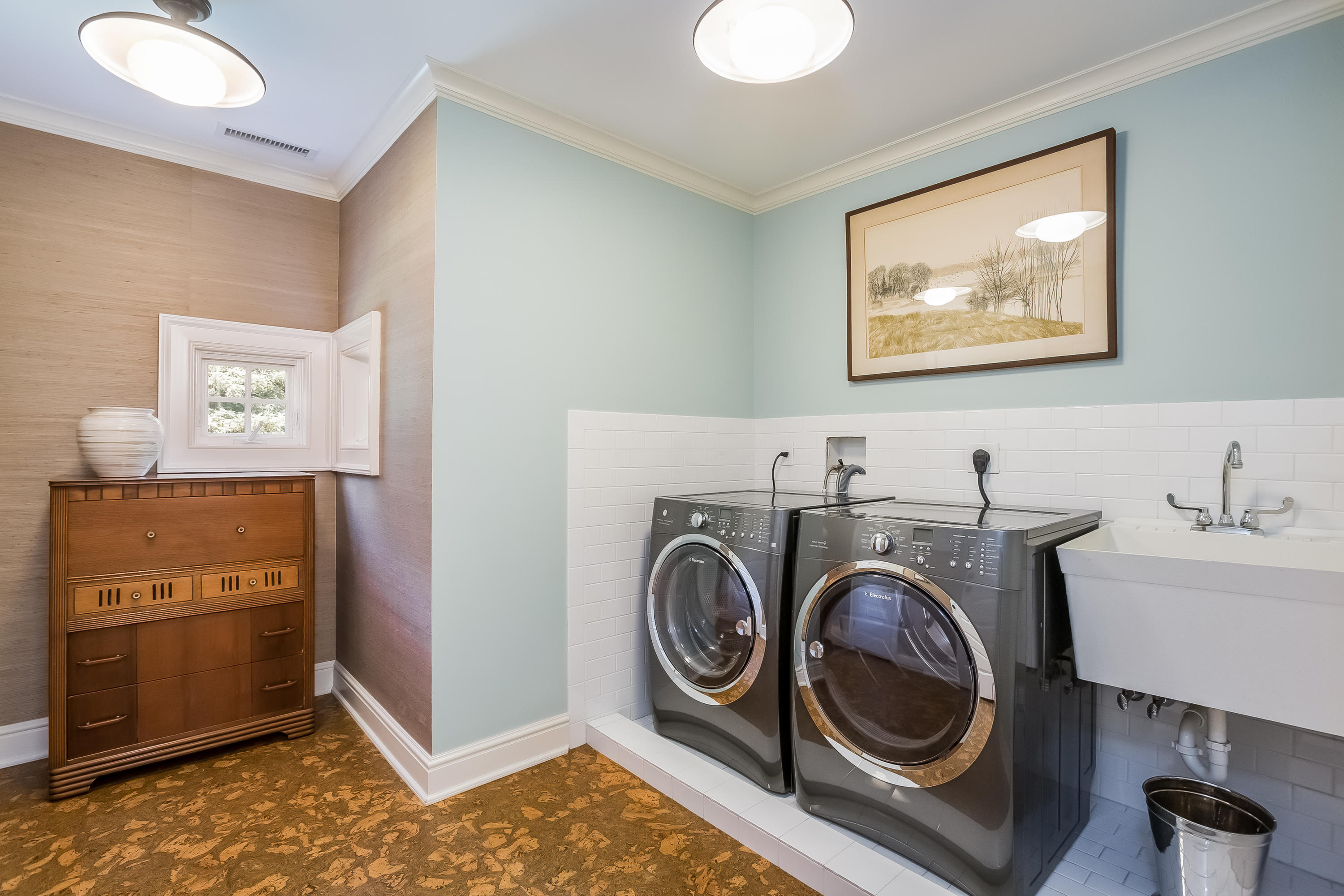 62 Stanton Road Darien, CT 06820 - Photo 36 of 52 a view of a storage & utility room with two washing machine