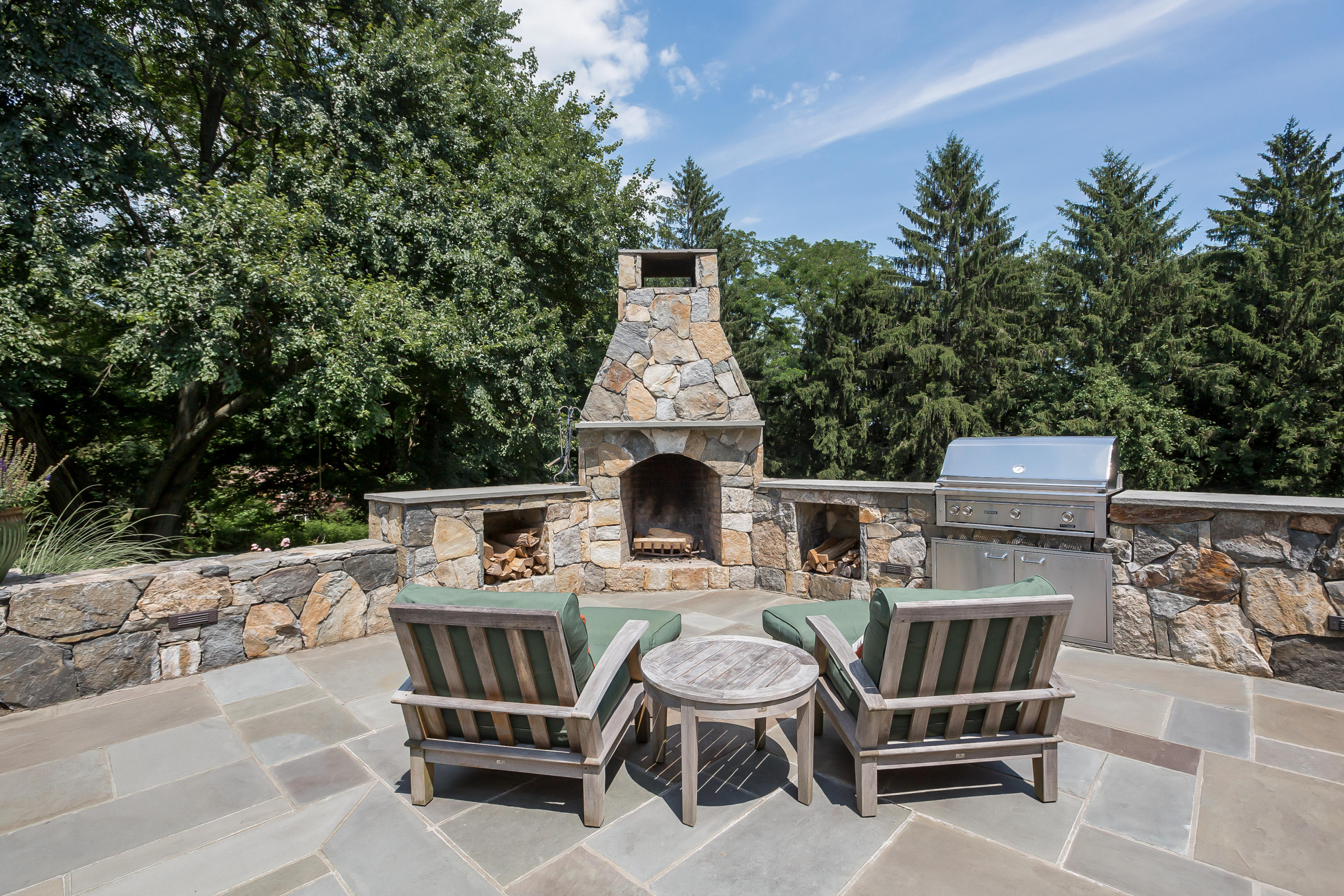 62 Stanton Road Darien, CT 06820 - Photo 39 of 52 a view of a chairs and tables in the patio
