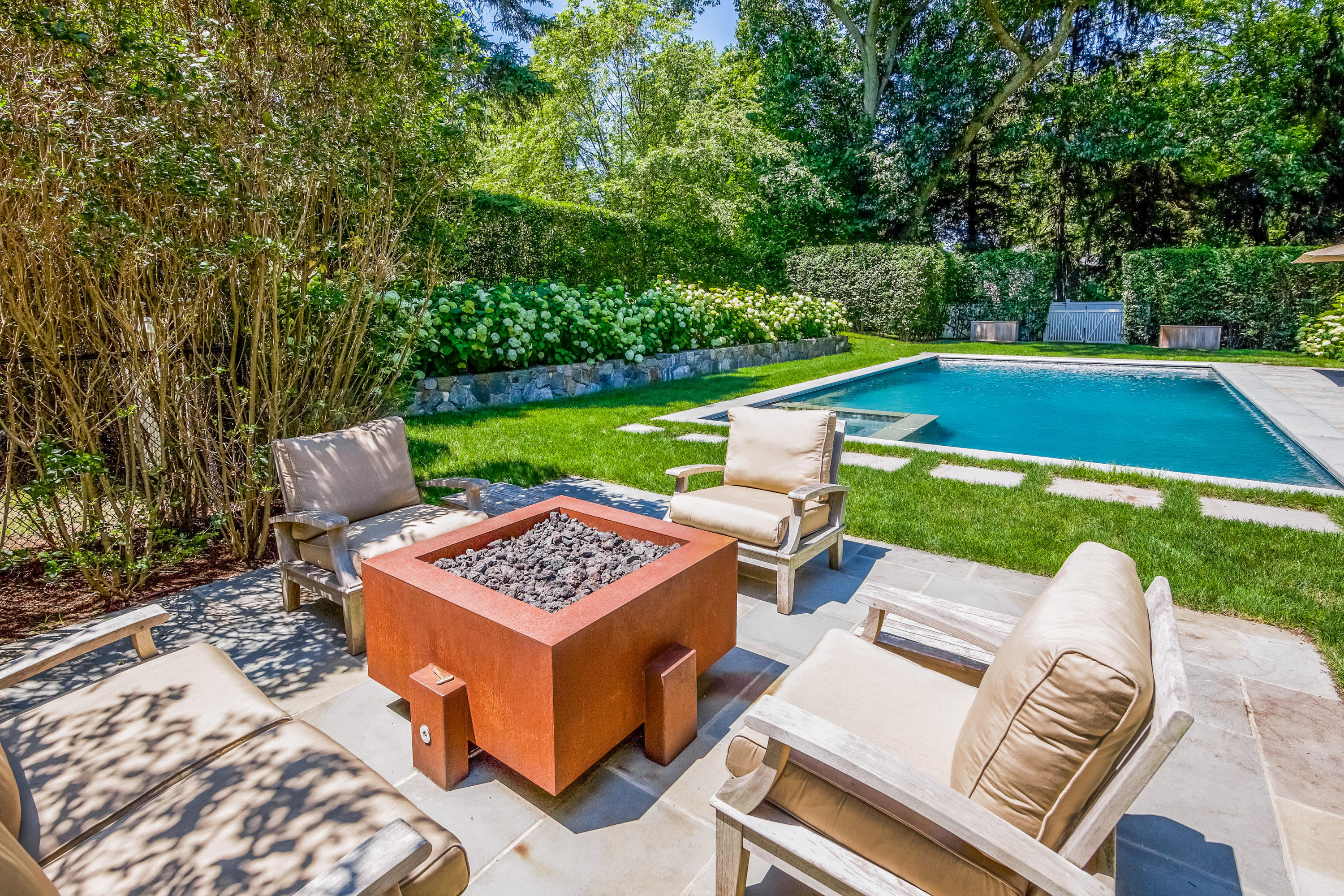 62 Stanton Road Darien, CT 06820 - Photo 44 of 52 a view of a backyard with sitting area