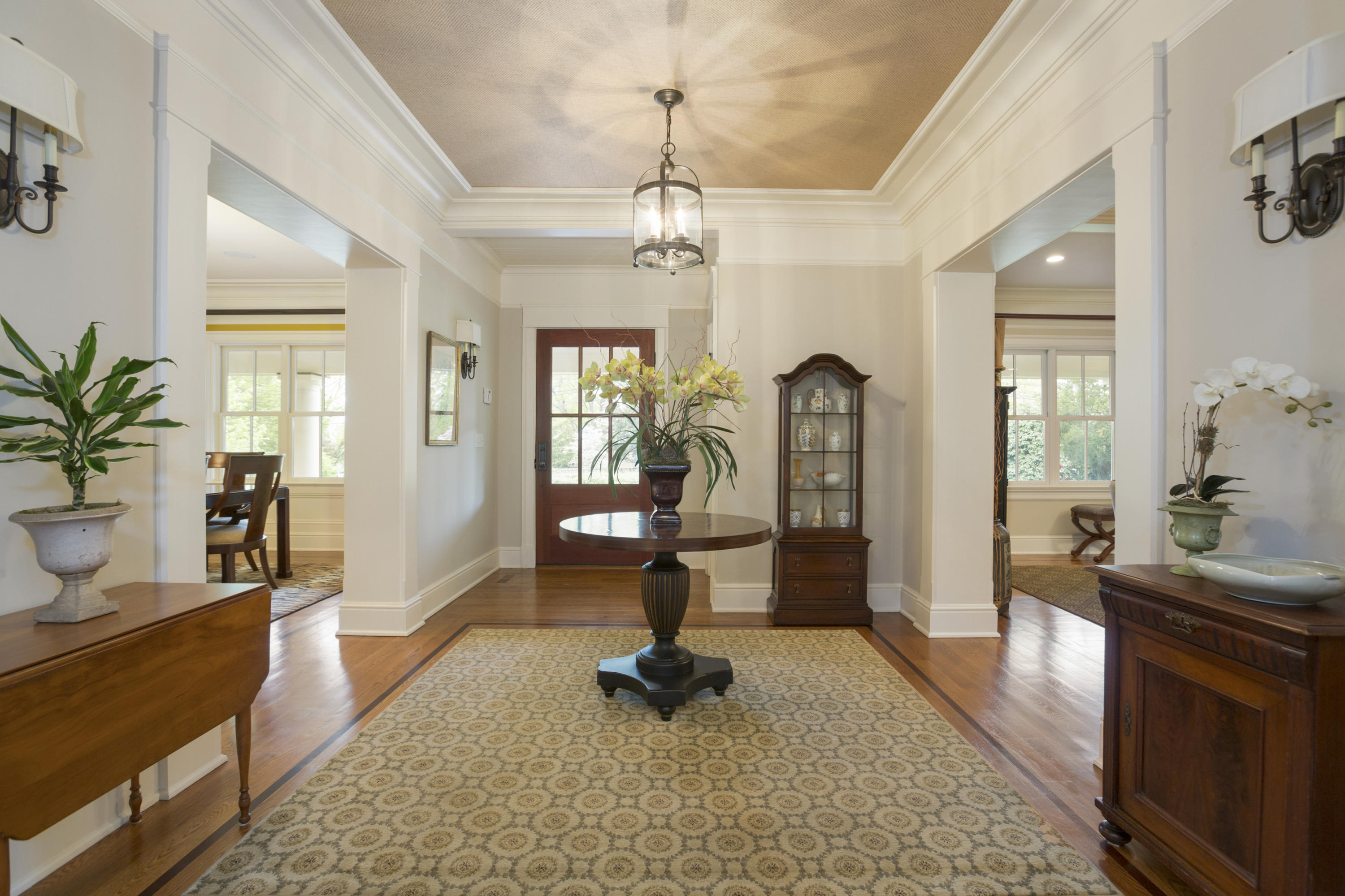 62 Stanton Road Darien, CT 06820 - Photo 5 of 52 a living room with furniture a window and a chandelier