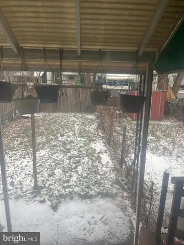 a view of backyard of a house