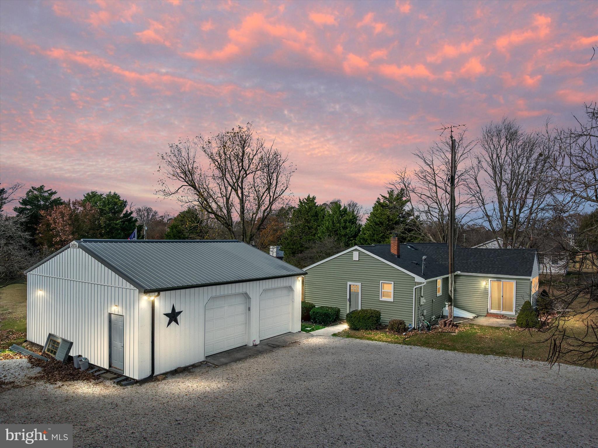 4305 Langrell Road Preston, MD 21655 - Photo 2 of 36 a front view of a house with a yard and garage