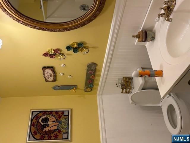 140 Euclid Avenue, Unit 4G Hackensack, NJ 07601 - Photo 11 of 13 a bathroom with a toilet and a sink