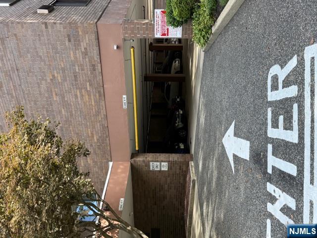 140 Euclid Avenue, Unit 4G Hackensack, NJ 07601 - Photo 13 of 13 a front view of a building with a yard