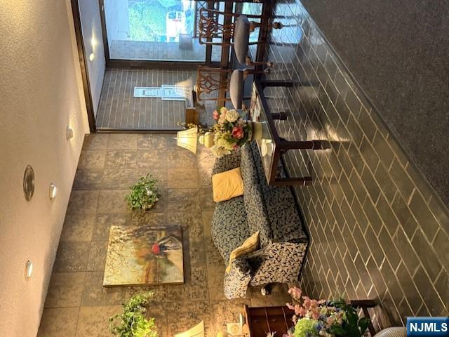 140 Euclid Avenue, Unit 4G Hackensack, NJ 07601 - Photo 2 of 13 a living room with furniture and a rug