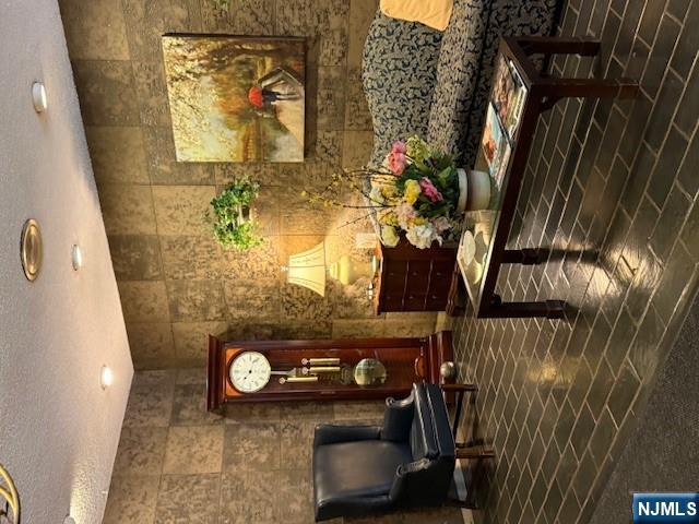 140 Euclid Avenue, Unit 4G Hackensack, NJ 07601 - Photo 3 of 13 a living room with fireplace furniture and a wooden floor