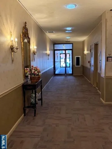 a view of livingroom with furniture and window