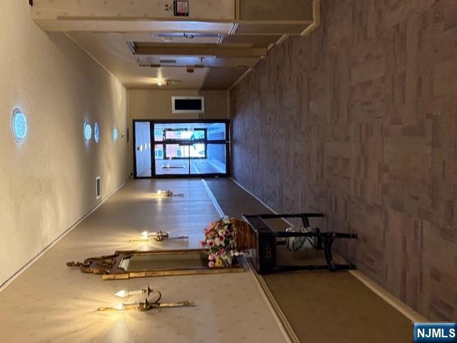 140 Euclid Avenue, Unit 4G Hackensack, NJ 07601 - Photo 4 of 13 a view of livingroom with furniture and window