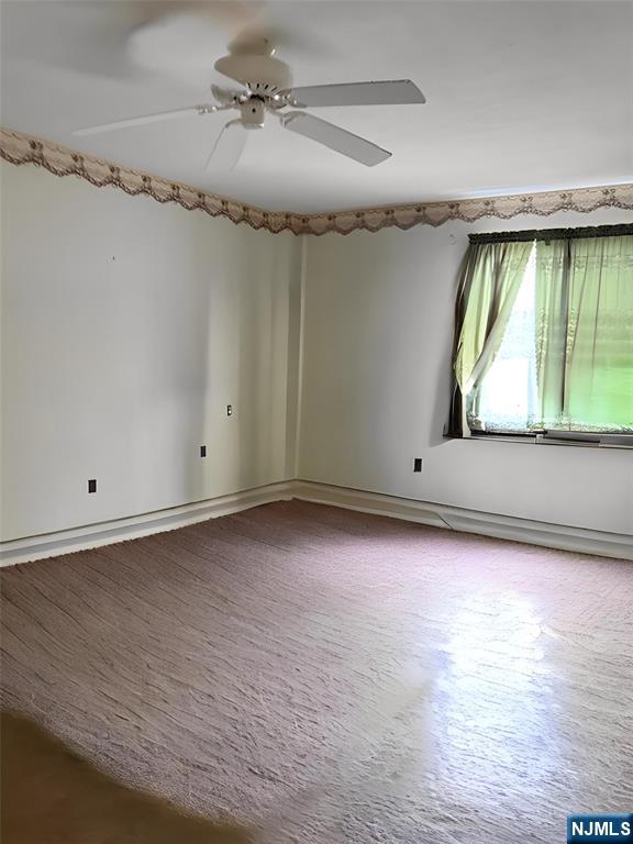 140 Euclid Avenue, Unit 4G Hackensack, NJ 07601 - Photo 10 of 13 wooden floor in an empty room