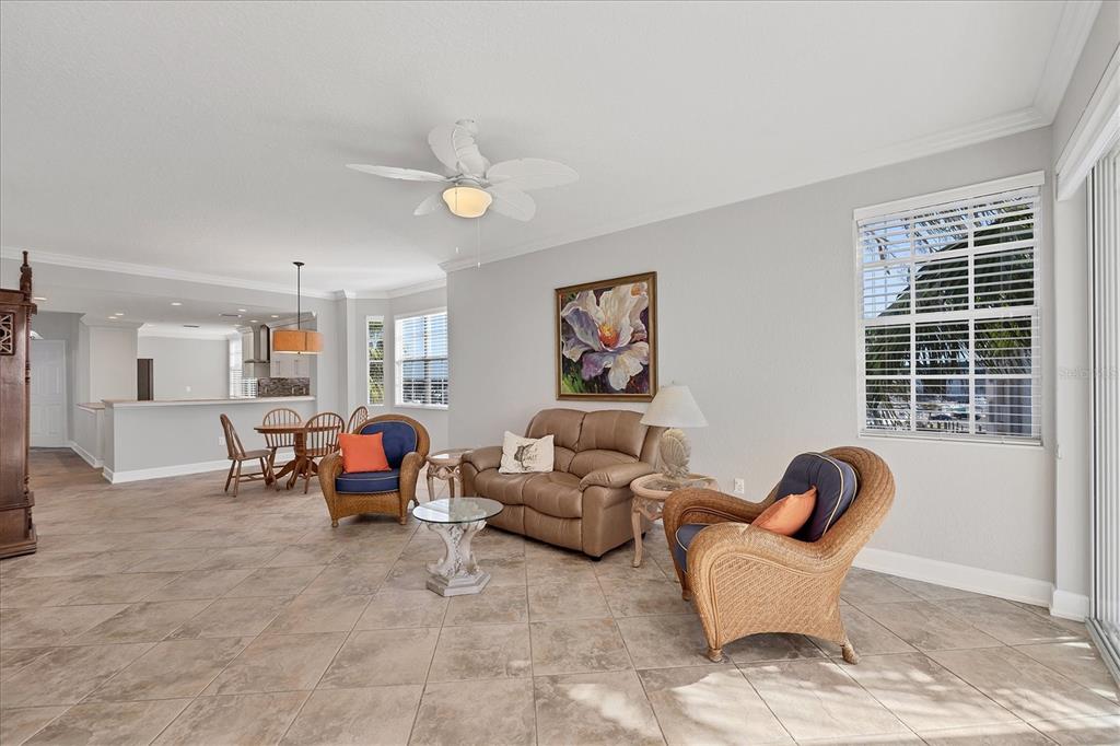 13313 Gasparilla Road, Unit C401 Placida, FL 33946 - Photo 5 of 30 a living room with furniture and a large window