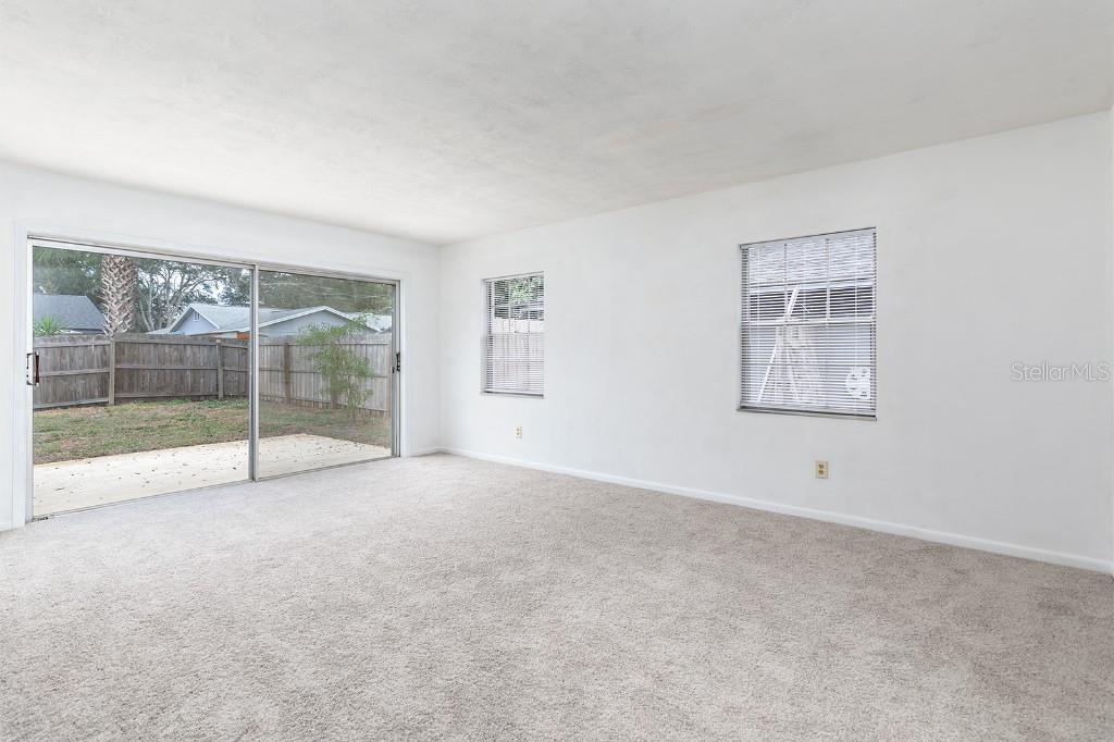 2453 Worthington Road Maitland, FL 32751 - Photo 11 of 22 a view of an empty room with a window