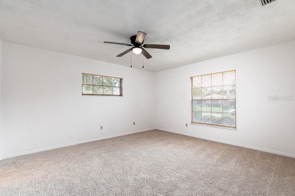 2453 Worthington Road Maitland, FL 32751 - Photo 14 of 22 a view of an empty room with a window