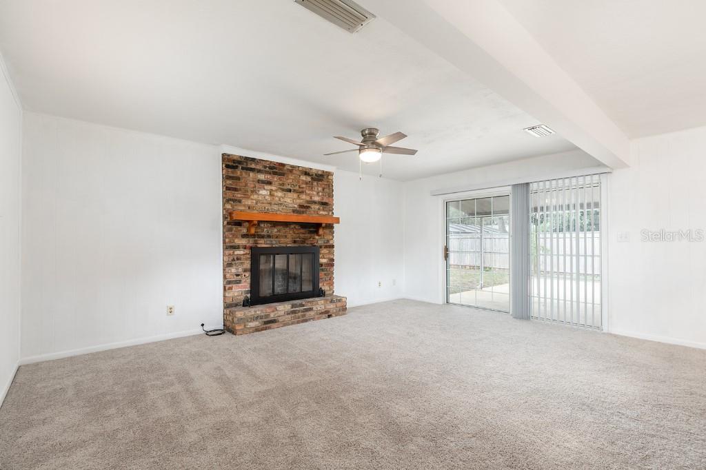 2453 Worthington Road Maitland, FL 32751 - Photo 8 of 22 a view of an empty room with a window