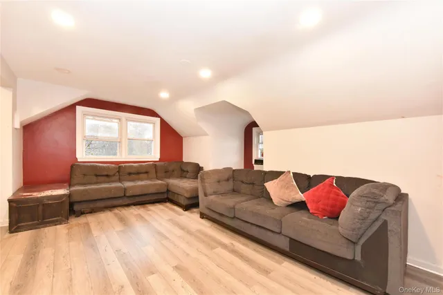 a living room with furniture and a couch