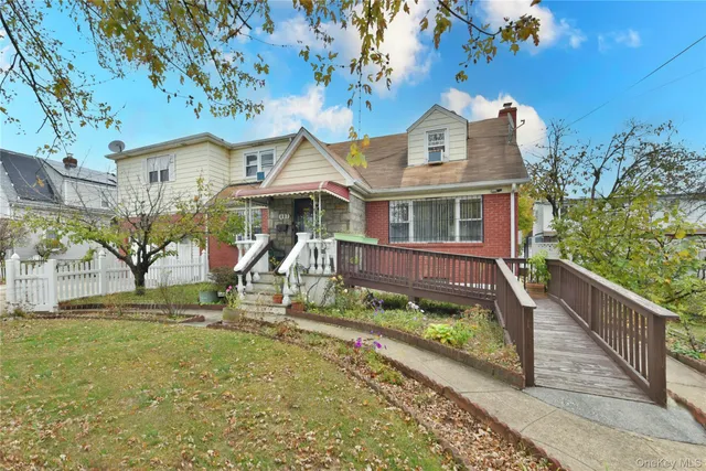 a front view of house with a yard