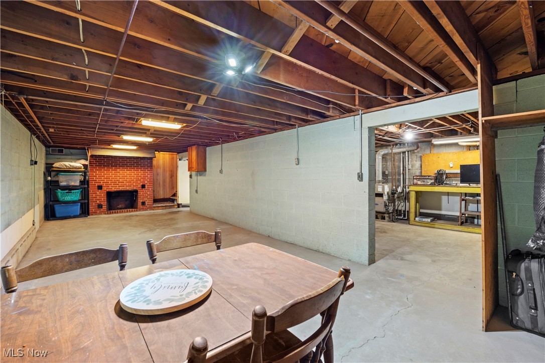 14312 Butler Road Wakeman, OH 44889 - Photo 28 of 42 Unfinished below grade area with a fireplace