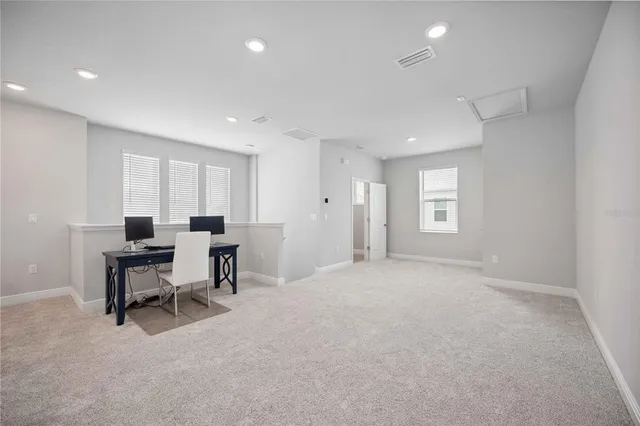 an empty room with windows