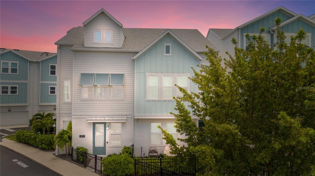 2344 Lindstrom Street Sarasota, FL 34237 - Photo 42 of 56 a front view of a house with plants