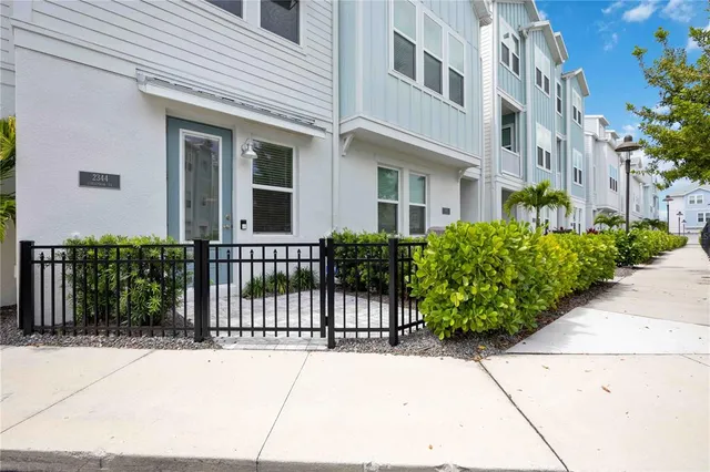a view of a building with a garden