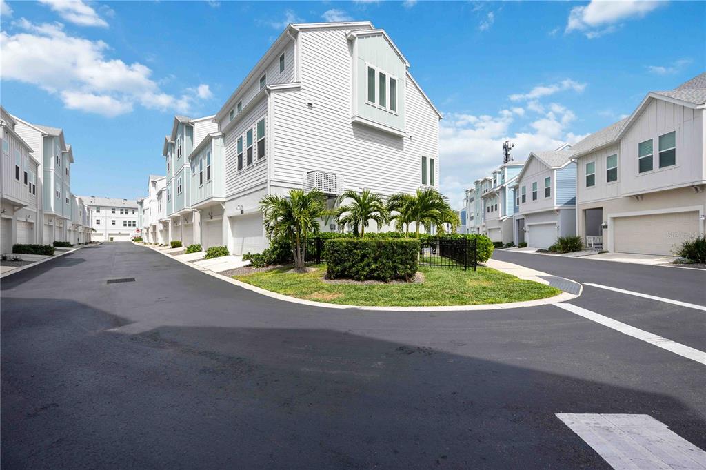 2344 Lindstrom Street Sarasota, FL 34237 - Photo 9 of 56 a view of a white house with a street